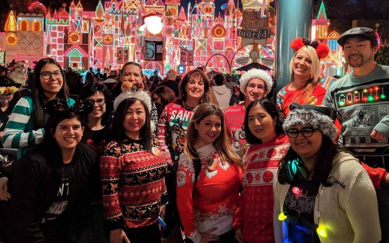 Nicole with her Disneyland Ugly Christmas Sweater group